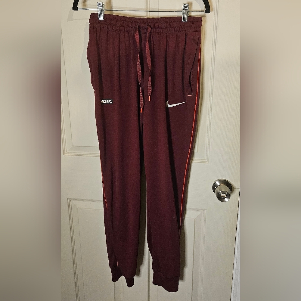 Nike Maroon Joggers with Orange Accents